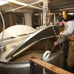 The mashing process brings a rice and water slurry to an optimal conversion temperature<br>